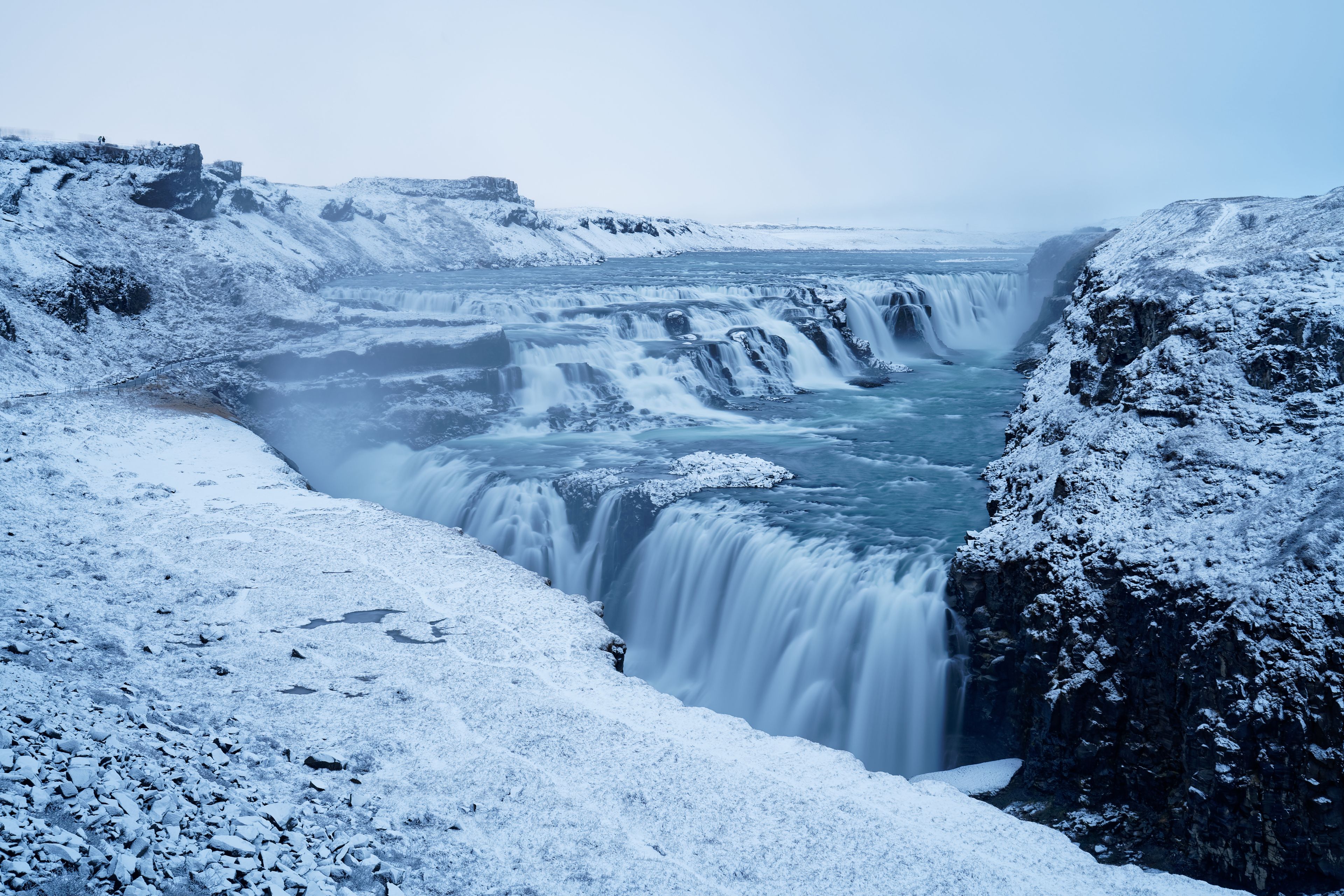 Gulfoss Waterfall in Iceland during snowfall in winter