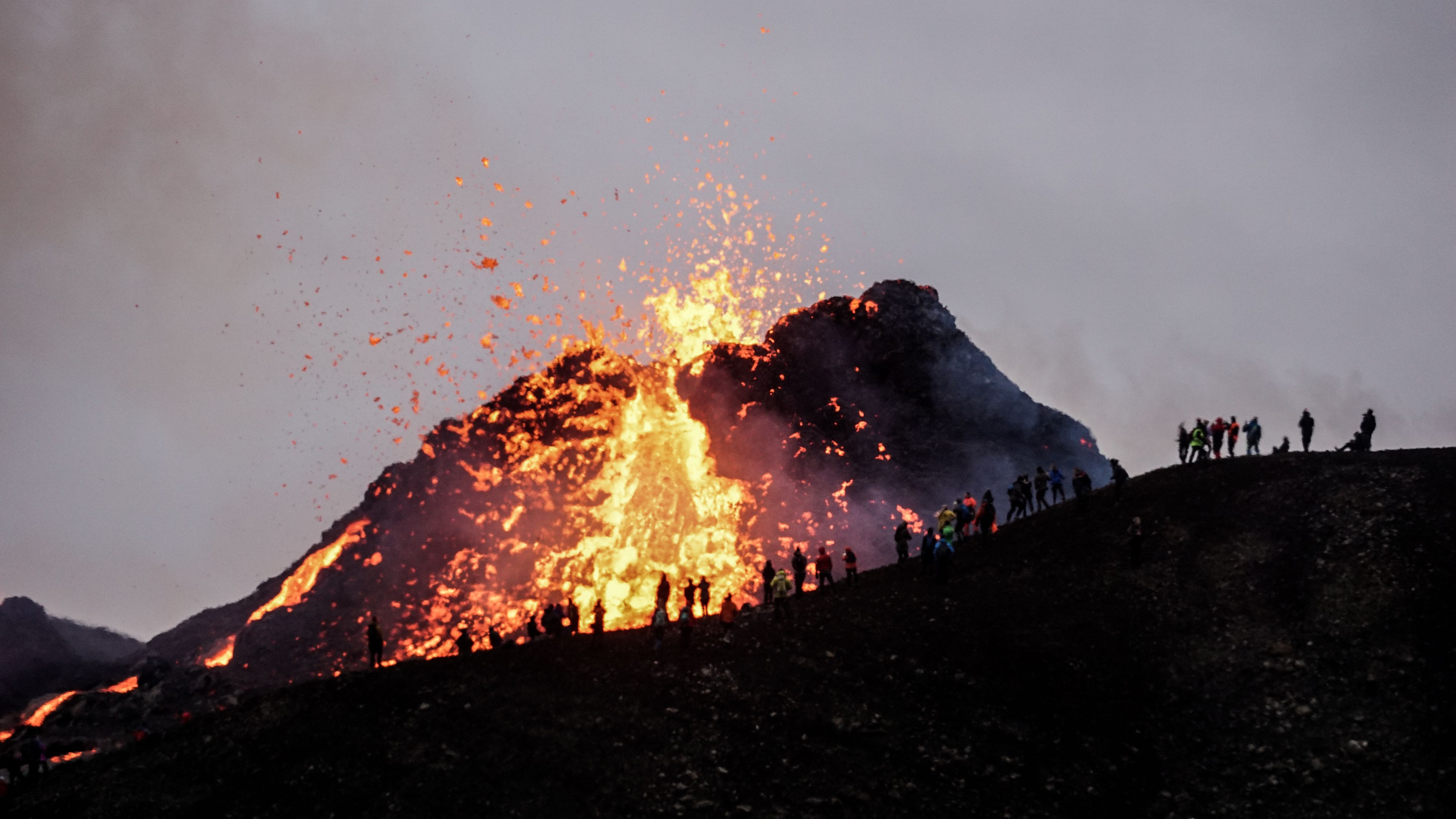 A view of Fagradalsfjall volcano with gases rising from the eruption site
