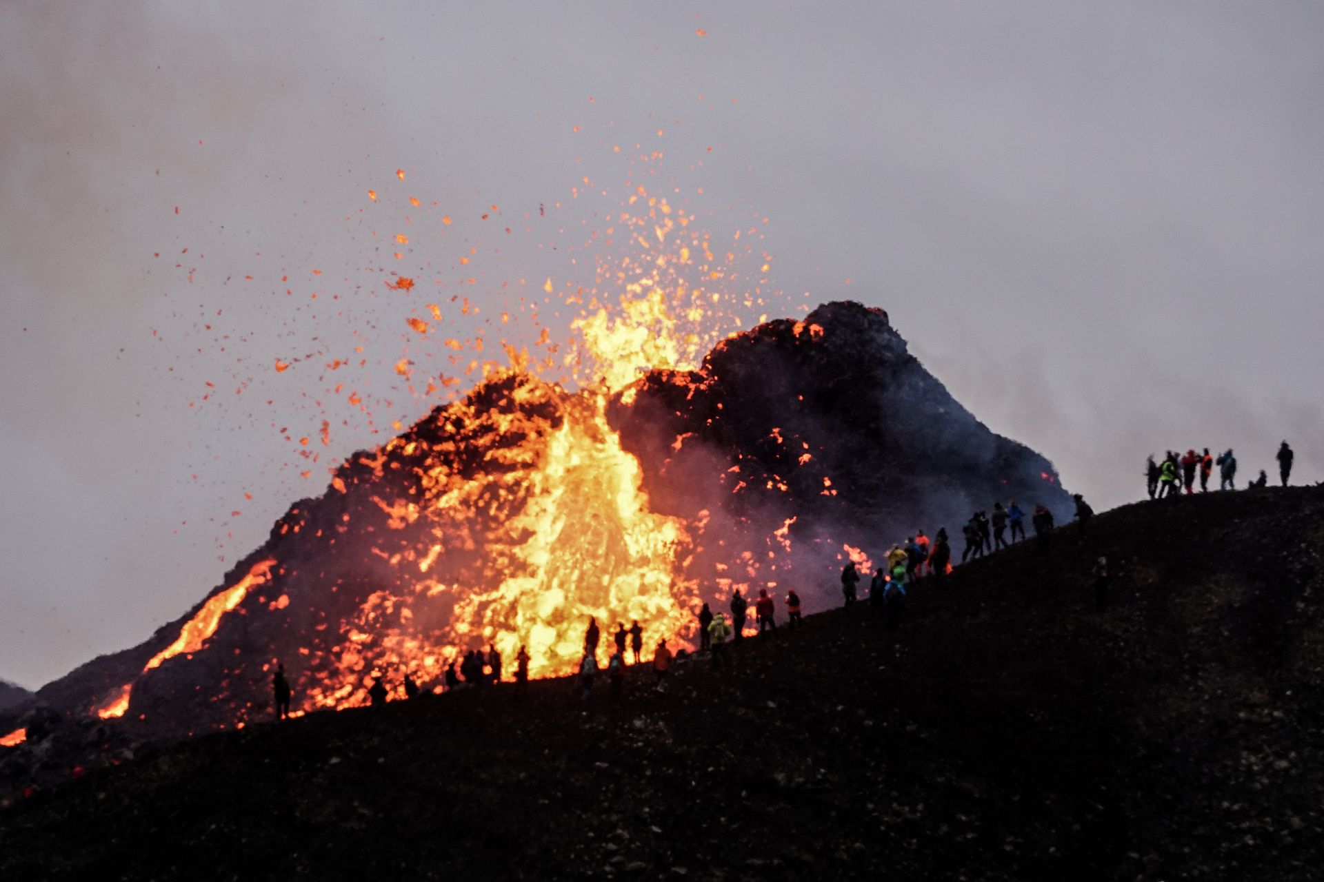 A view of Fagradalsfjall volcano with gases rising from the eruption site