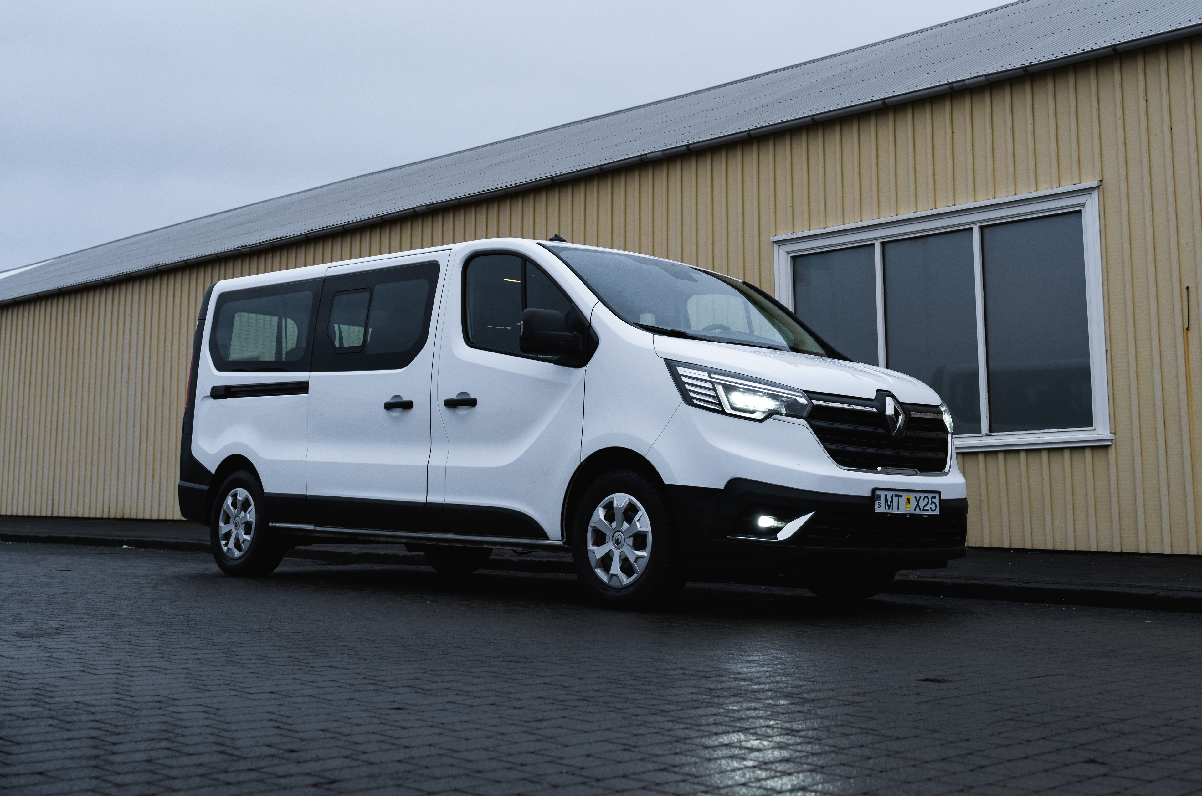 White Renault Trafic rental car van with Go car rental iceland