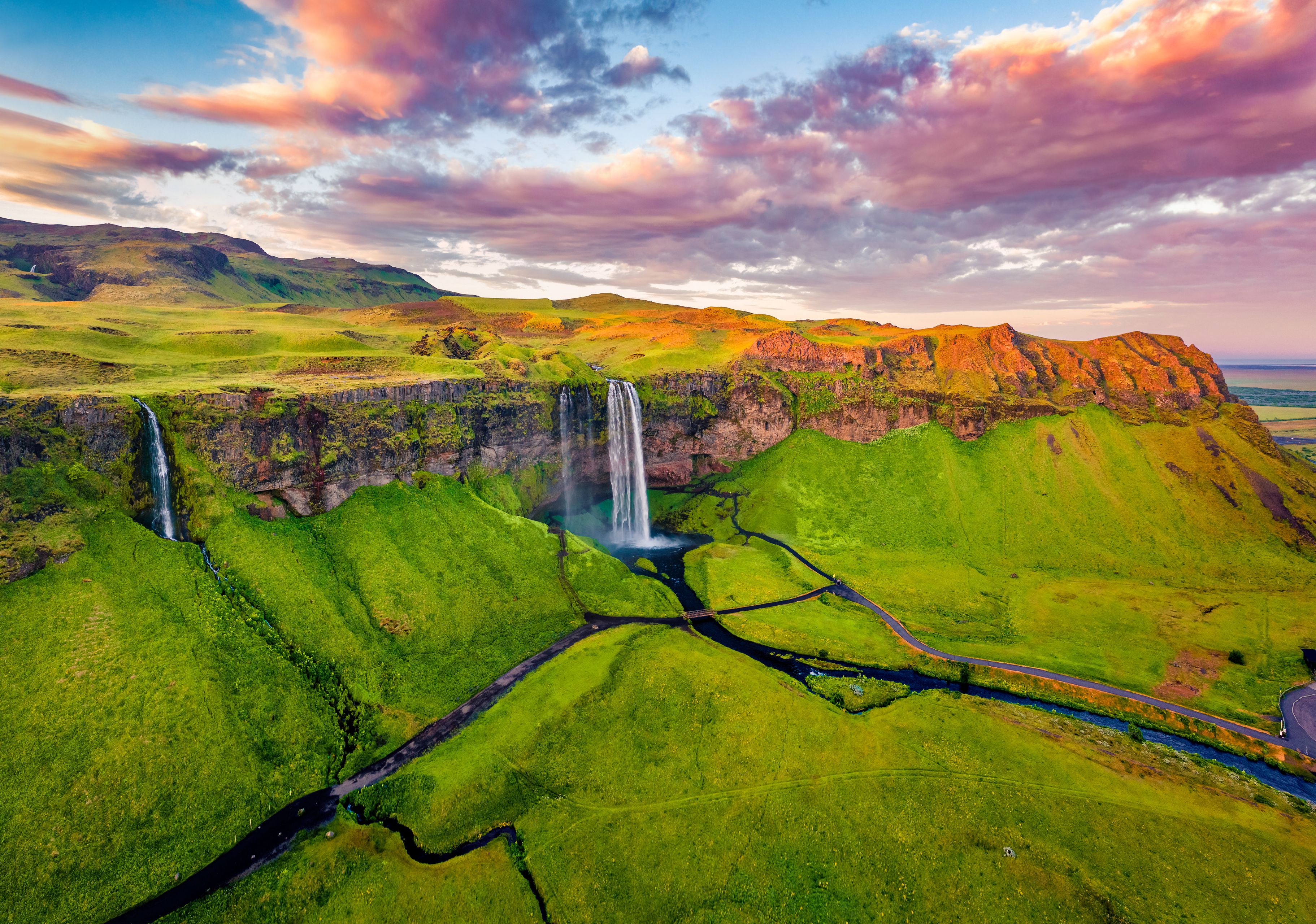 Captivating summer view of Seljalandsfoss waterfall in June in Iceland
