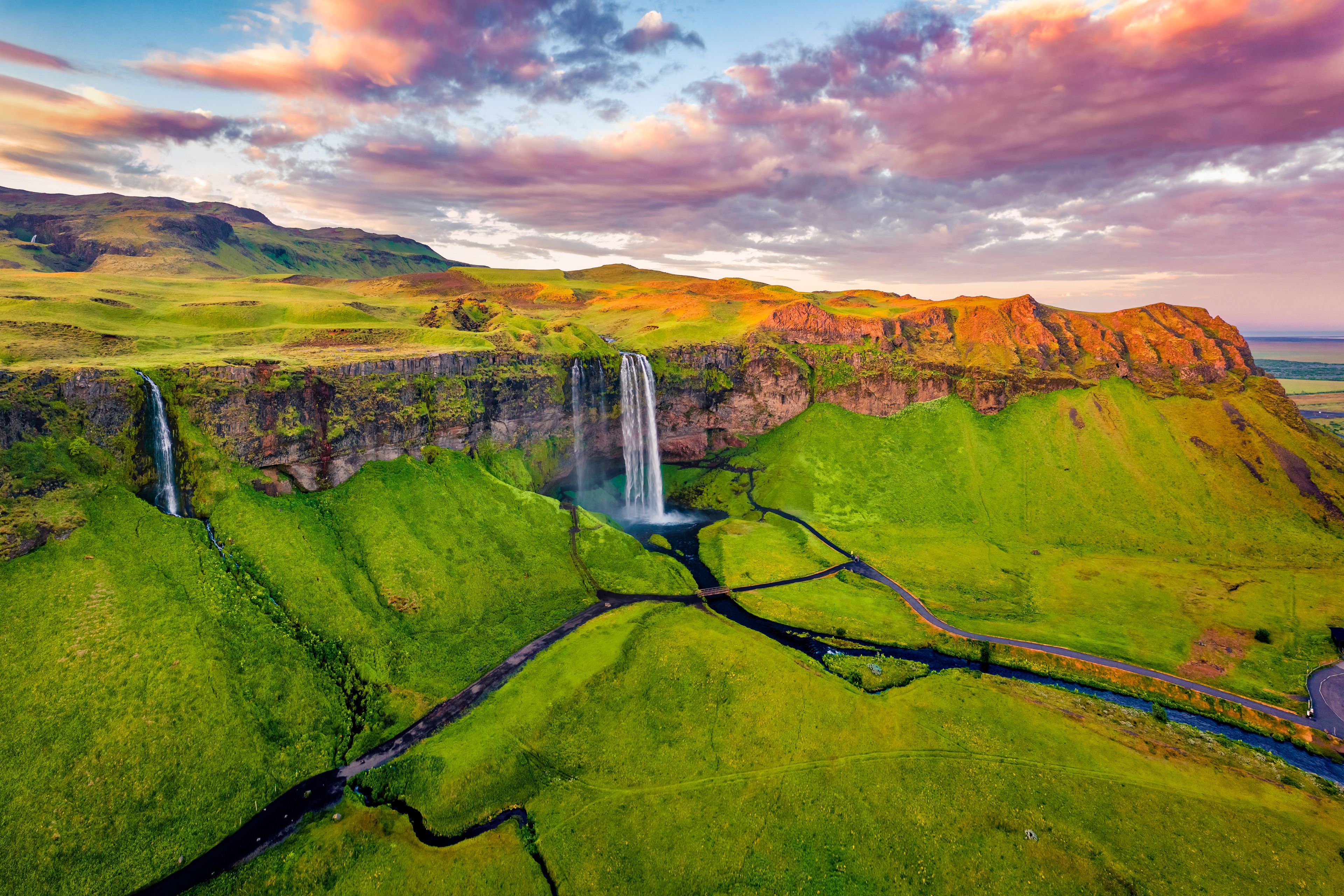 Captivating summer view of Seljalandsfoss waterfall in June in Iceland