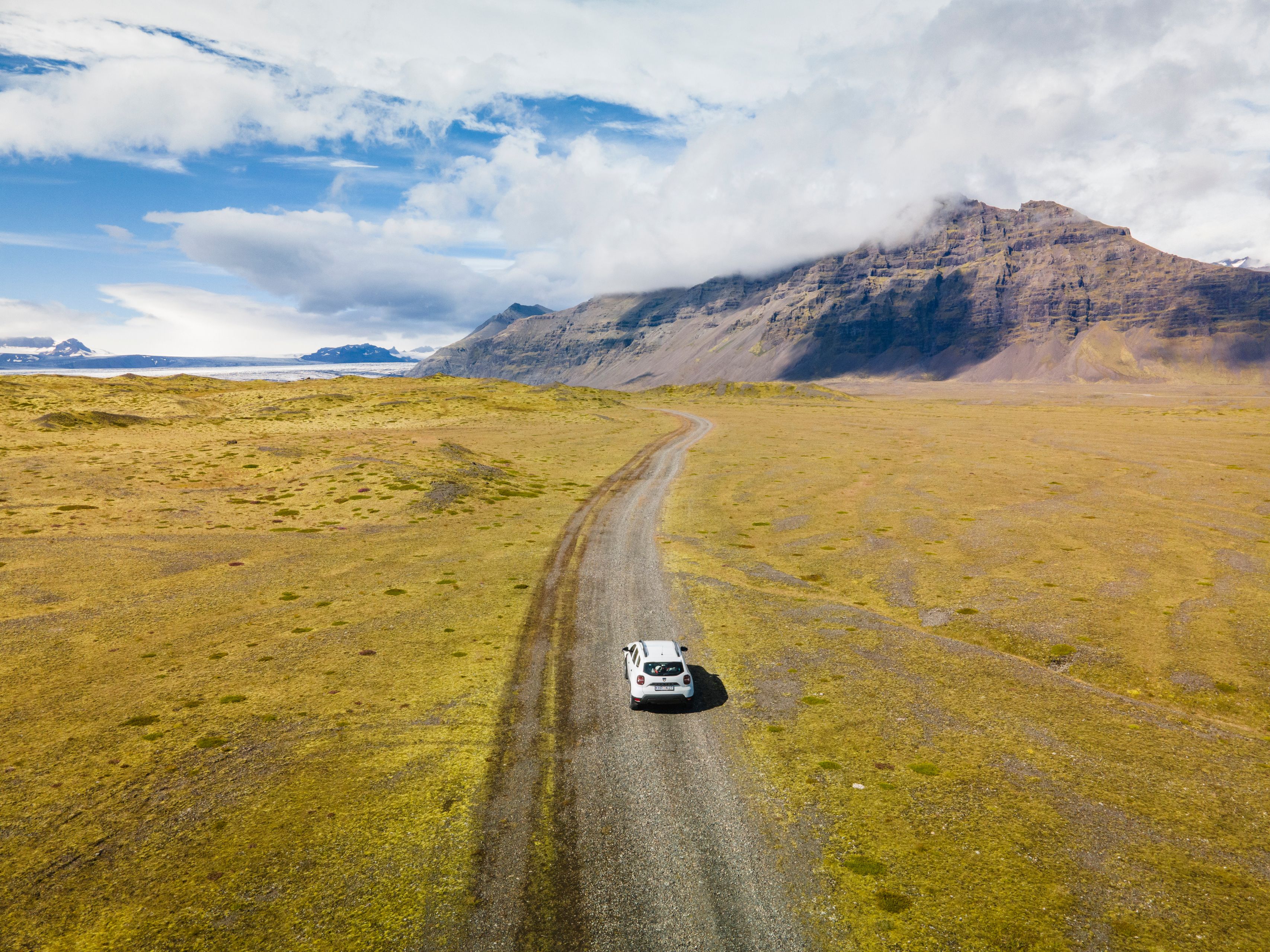 Rental car on a beautiful Iceland road.