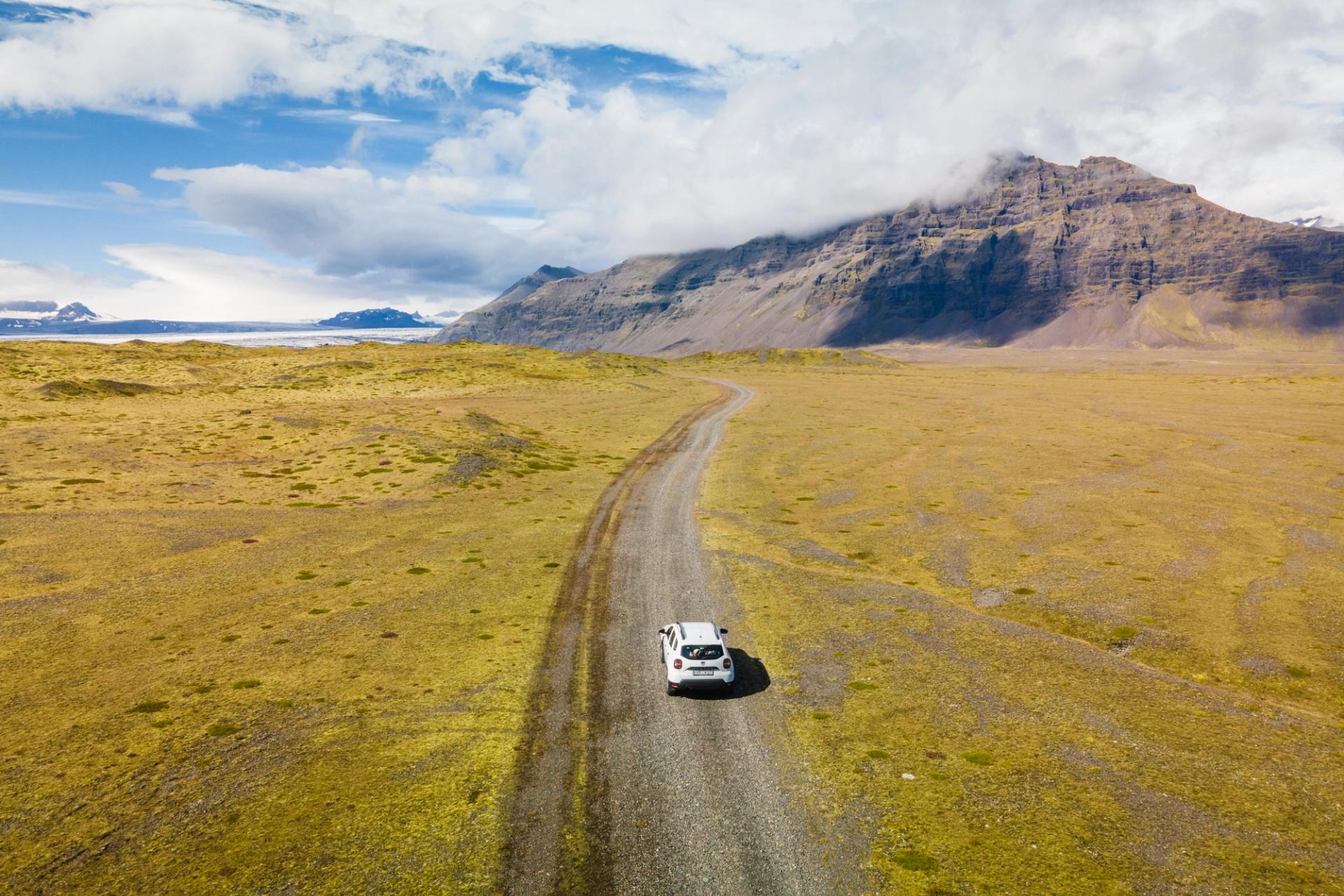 Rental car on a beautiful Iceland road.
