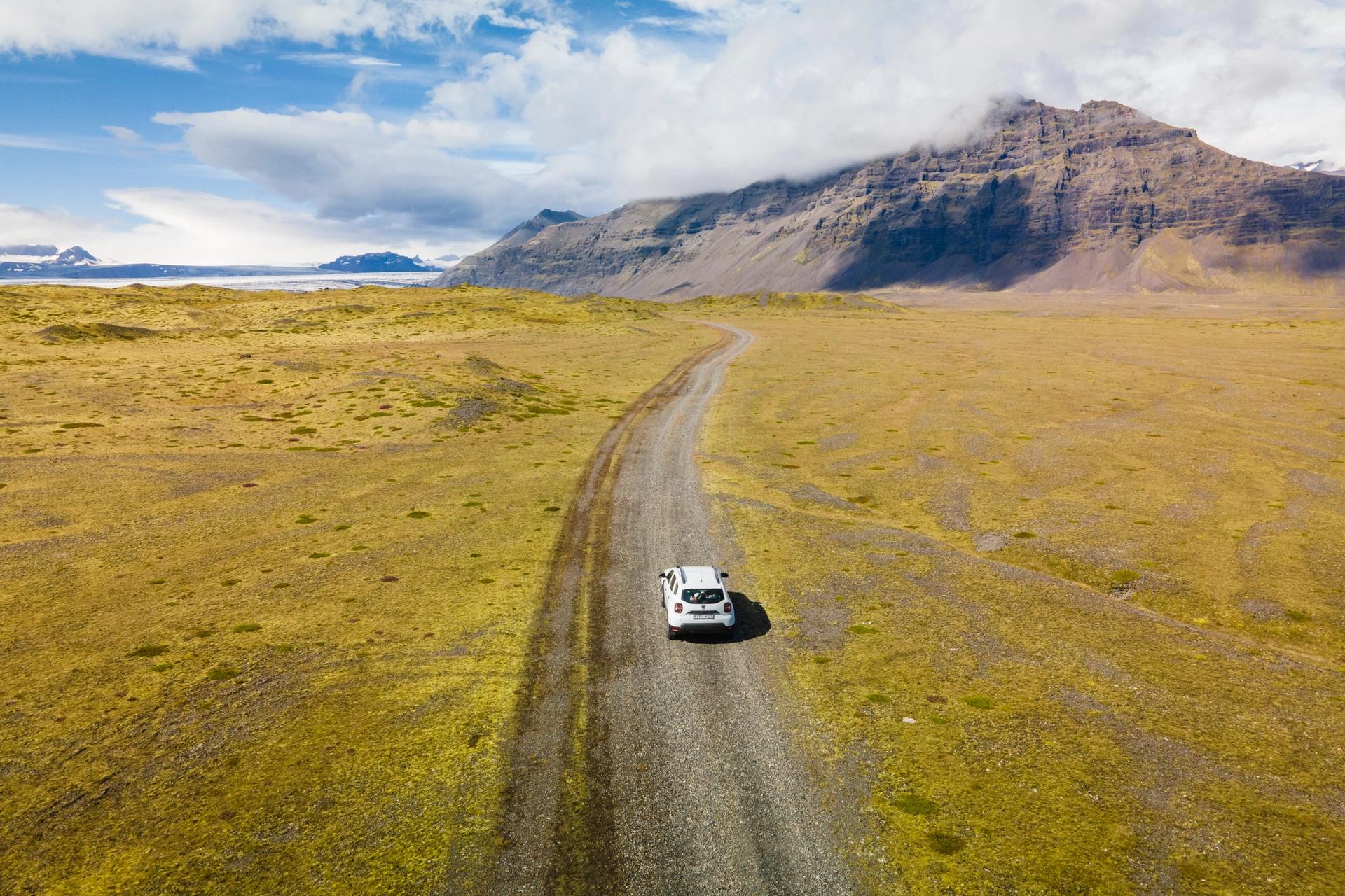 Dacia Duster riding a gravel road in Iceland 