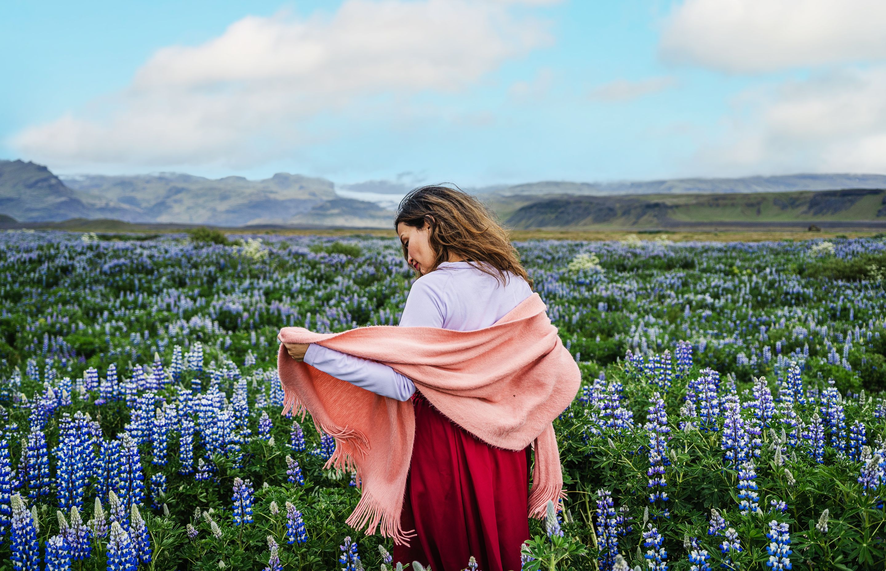 A woman visiting iceland in june during sunny days