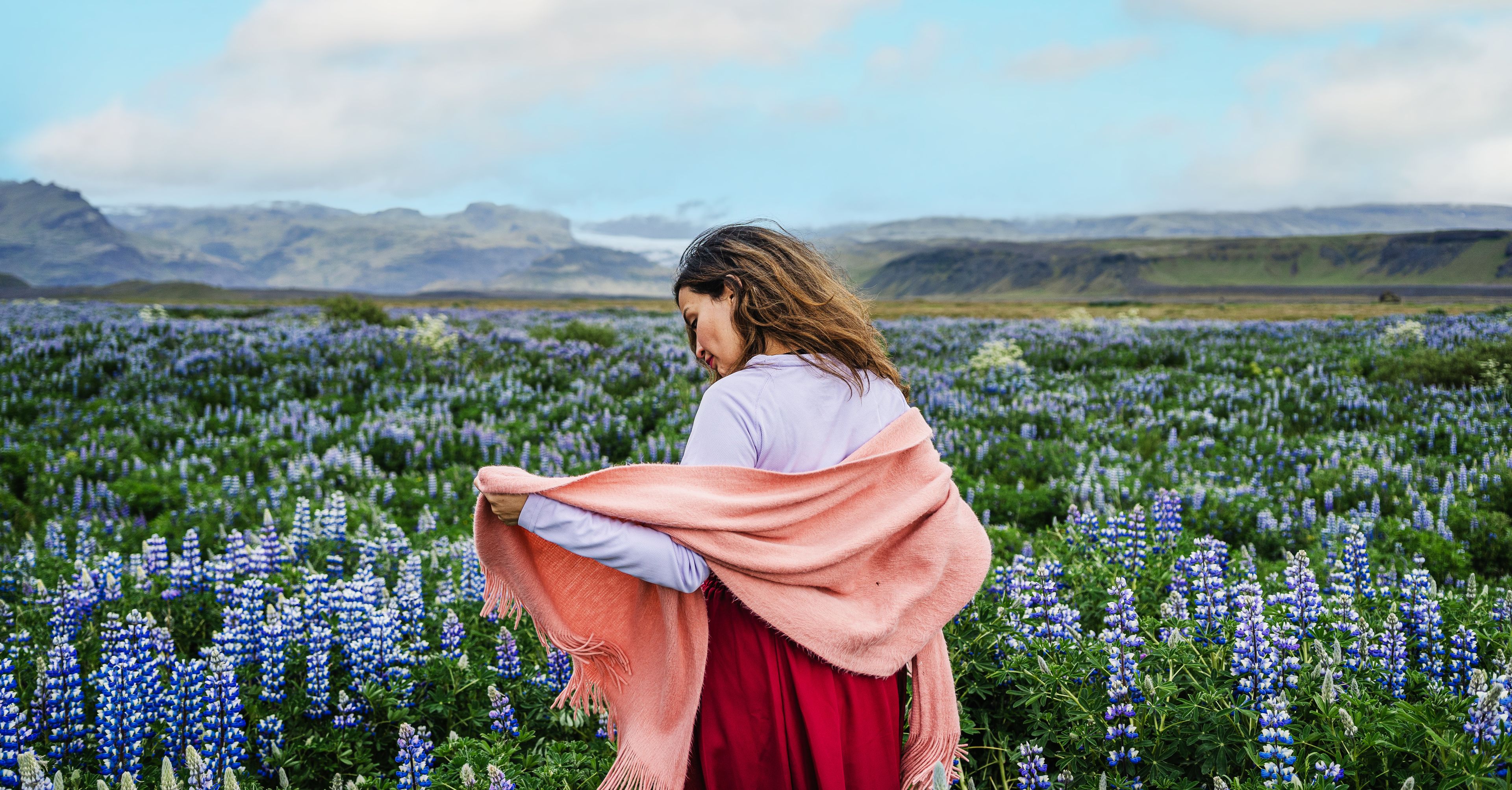 A woman visiting iceland in june during sunny days