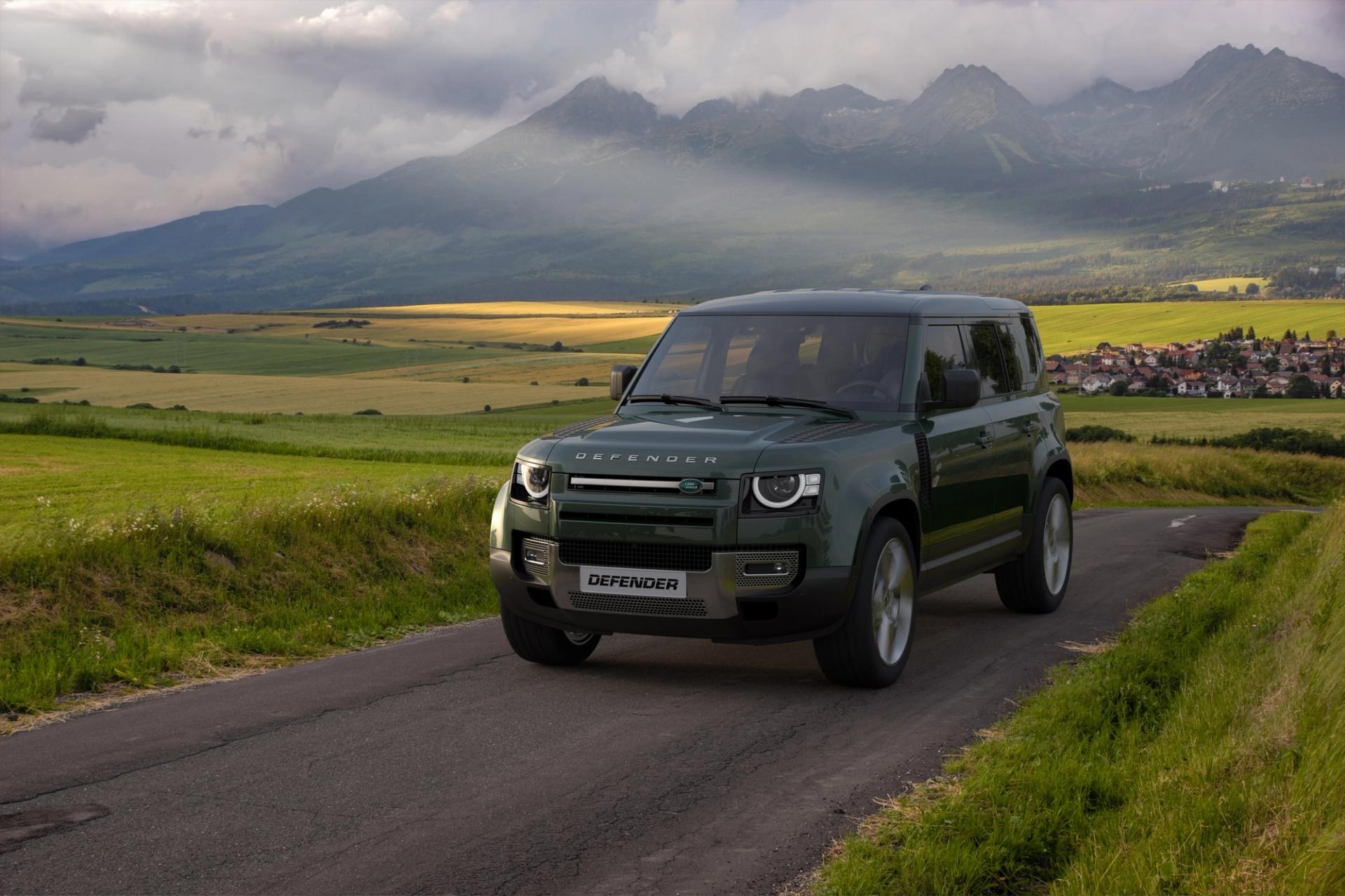 Land Rover Defender on a scenic road