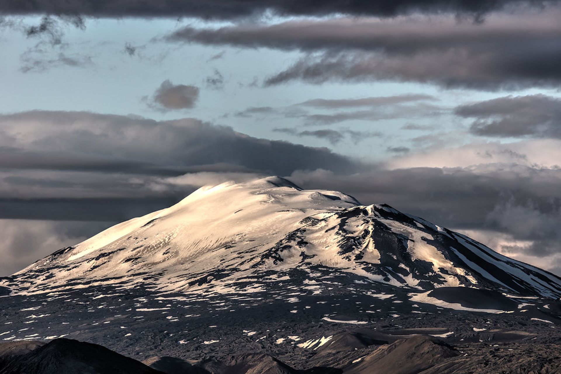 The imposing, menacing Hekla stratovolcano, one of Iceland's most active volcanoes, seen from the road from Landmannalaugar