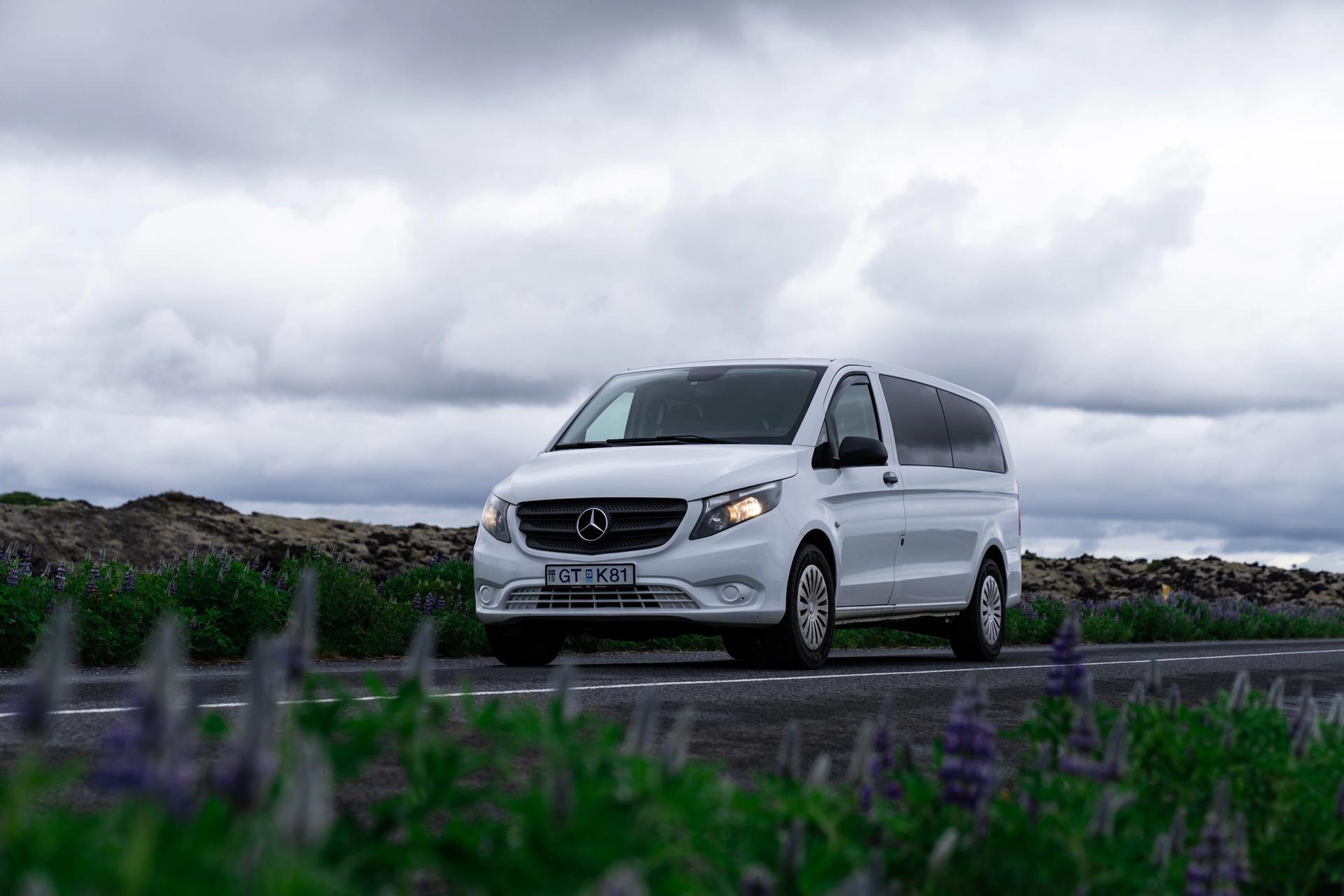 A Mercedes Vito minivan for 9 people on a road in Iceland 