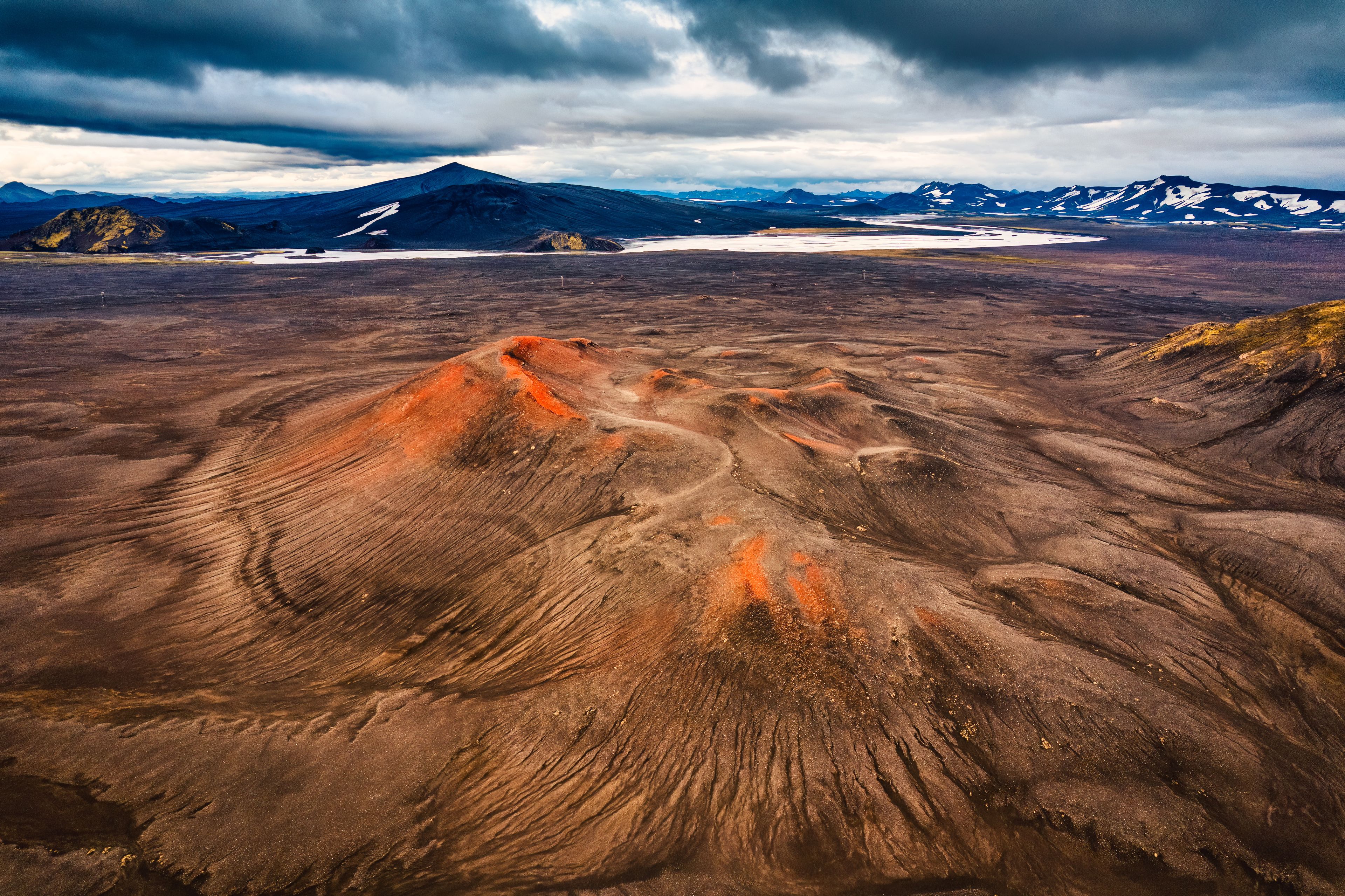 Red volcano crater with moody sky in the central highlands on summer at Iceland