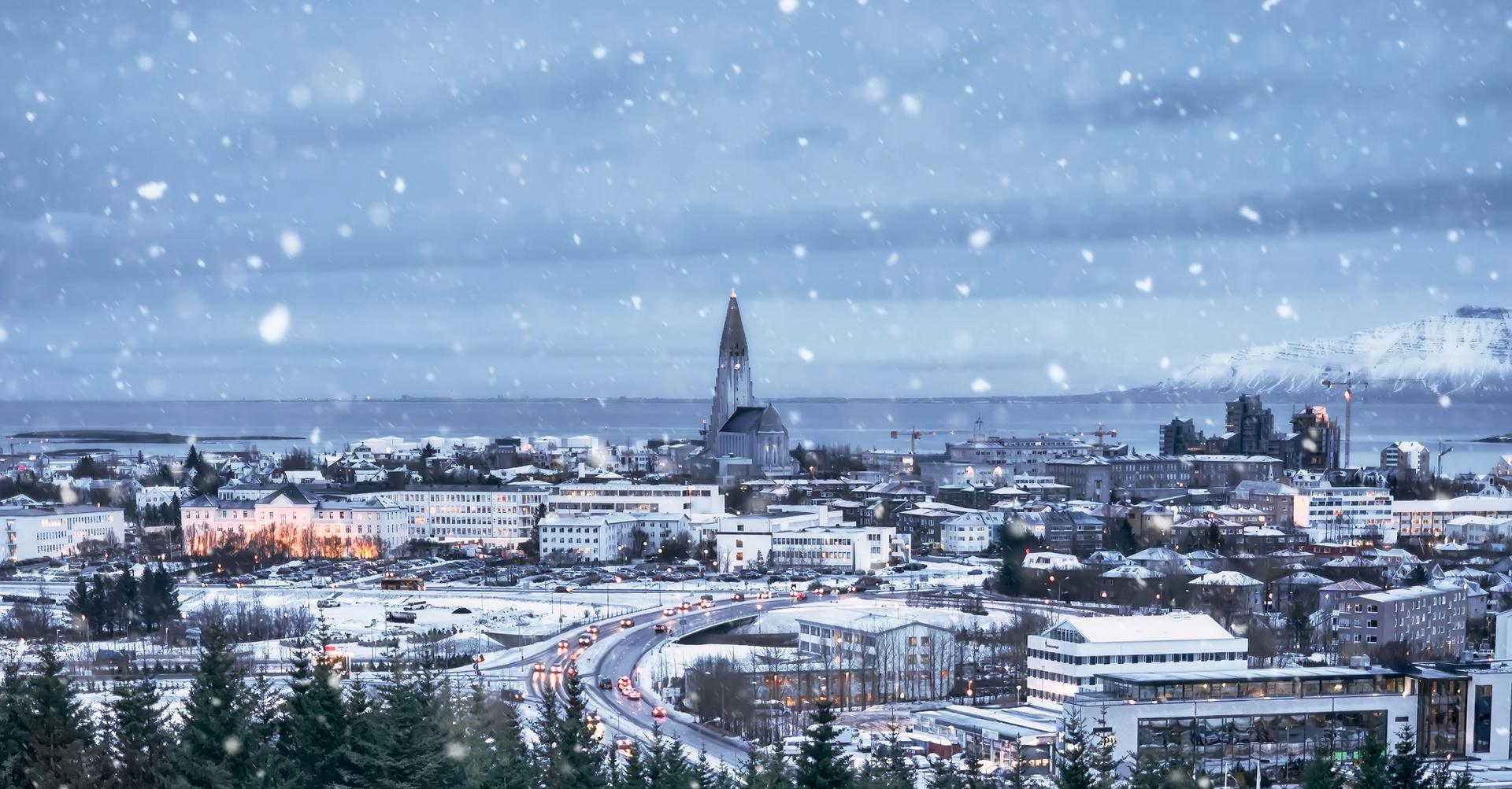 A snowy view of Reykjavik Iceland with Hallgrímskirkja in the background