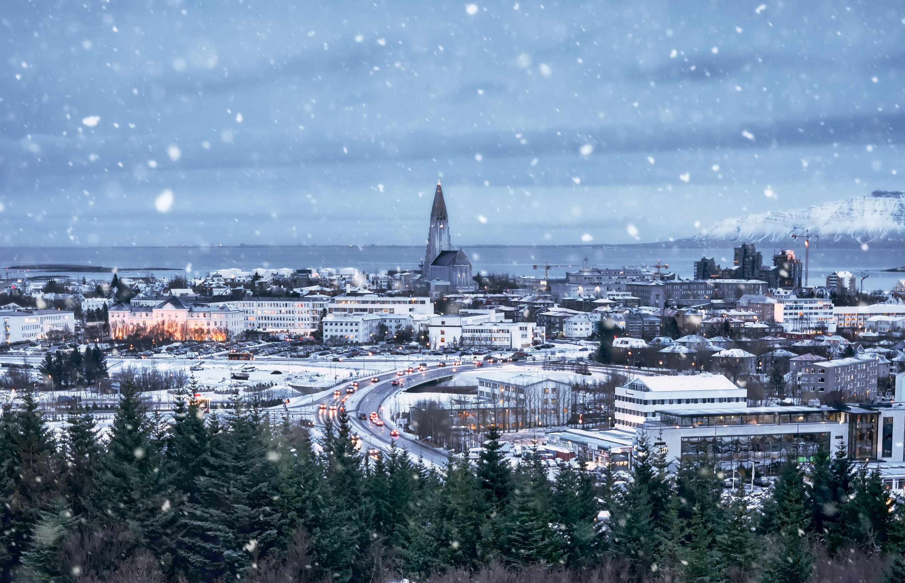 A snowy view of Reykjavik Iceland with Hallgrímskirkja in the background