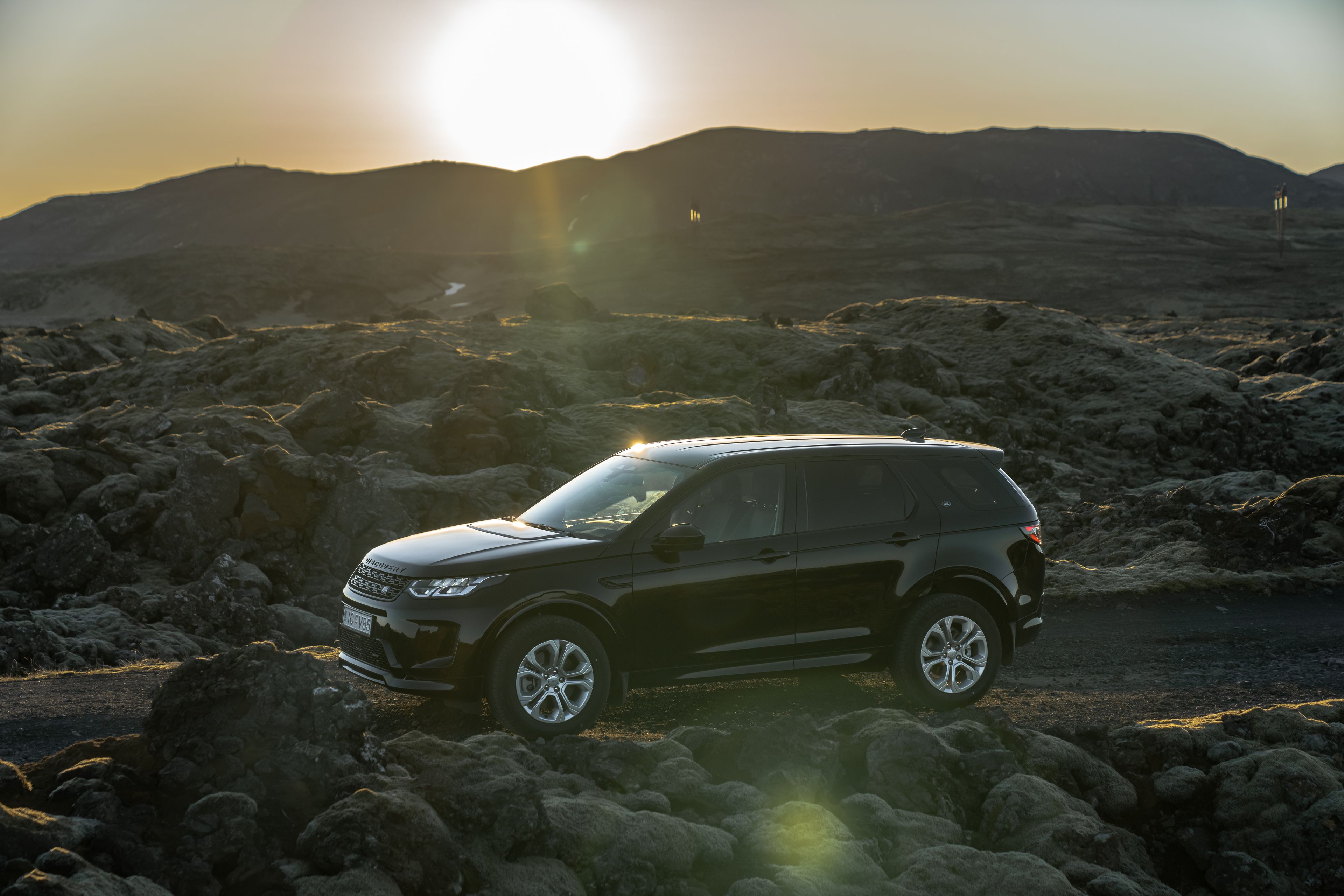 The land rover discovery sport in a gravel road in Iceland 