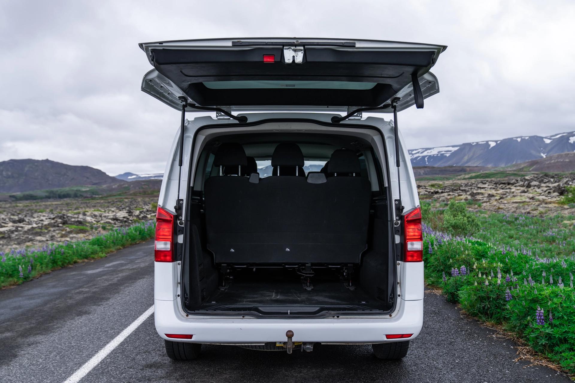 The spacious boot of a Mercedes Benz Vito, an ideal choice for car hire in Iceland, highlighting its abundant luggage capacity.
