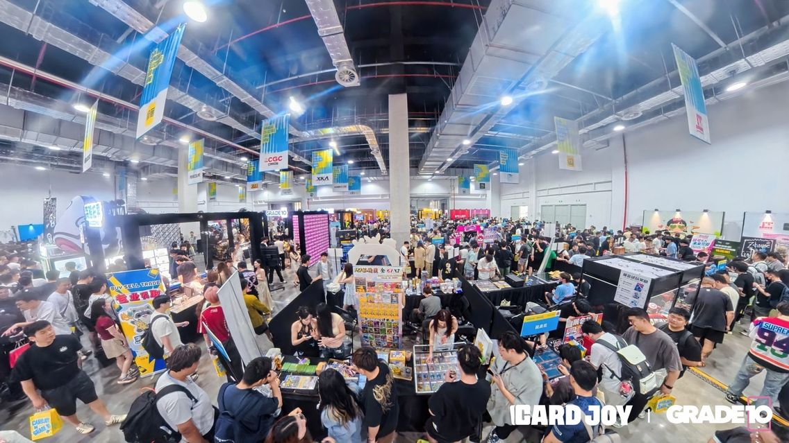 A wide view across the packed CARDJOY x Grade10 exhibition hall.