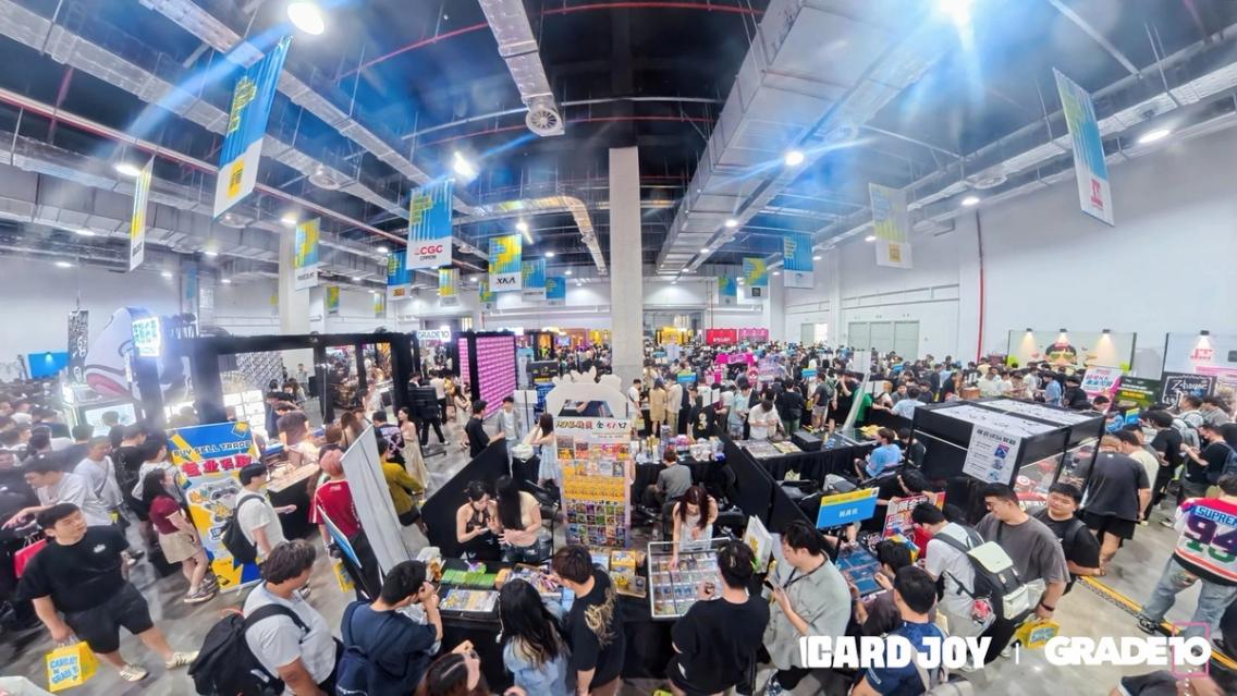 A wide view across the packed CARDJOY x Grade10 exhibition hall.