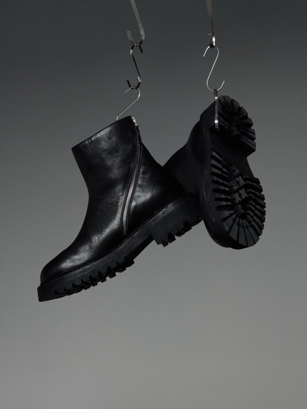 Black leather zip boots