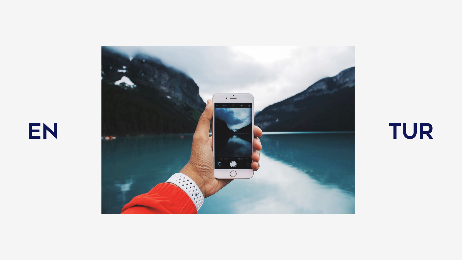 Entur-logoen spredd horisontalt på rammen av et bilde