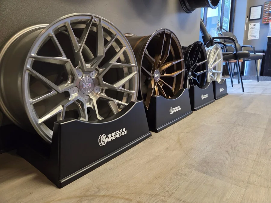 Several wheels on display in the front office.