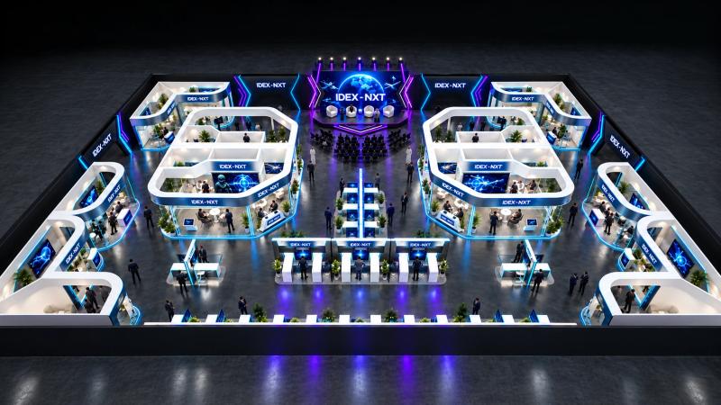 Concept illustration of an IDEX NXT exhibition floor, with stands arranged around a central stage