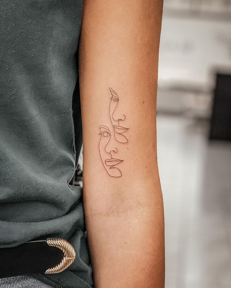 Small floral first tattoo design with delicate linework