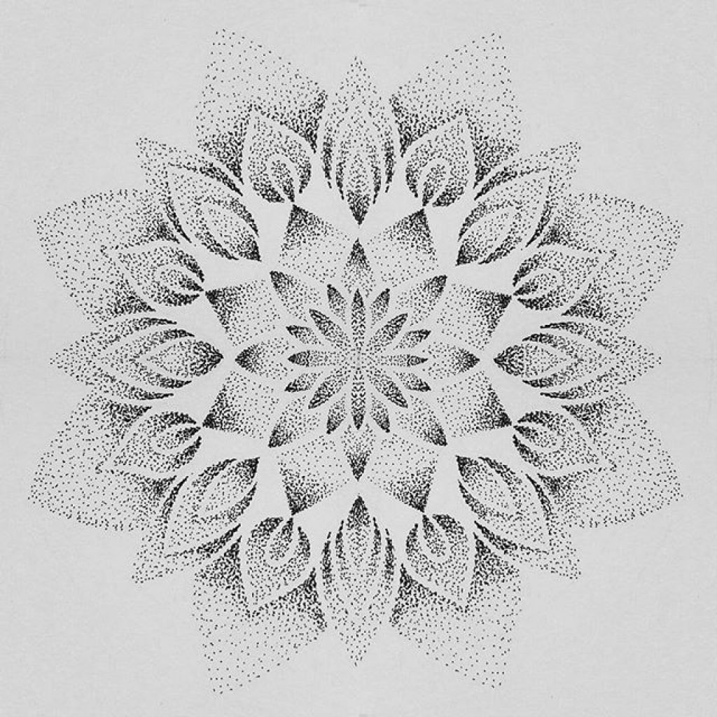 Dotwork geometric mandala tattoo with intricate stippled shading on upper arm