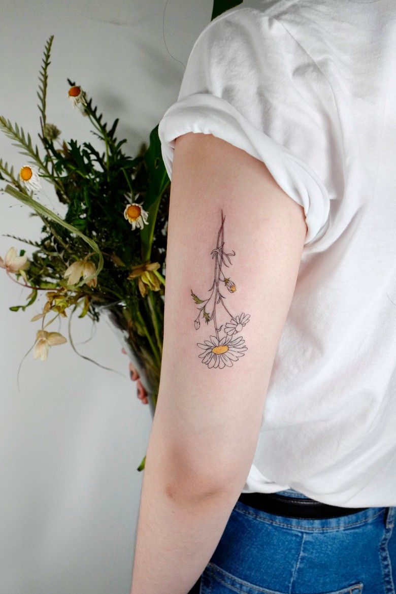 Modern fine-line tattoo with intricate geometric and organic elements trending in 2026