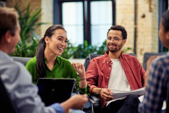 Man and woman in a relaxed work meeting