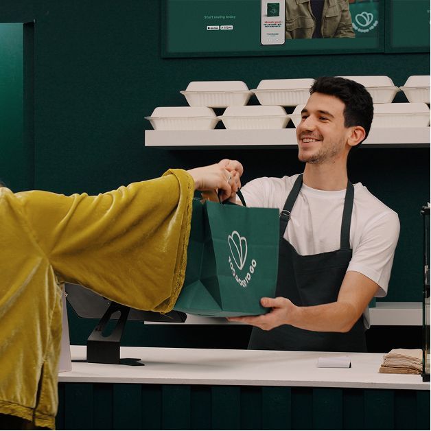 A man handovers a surprise bag