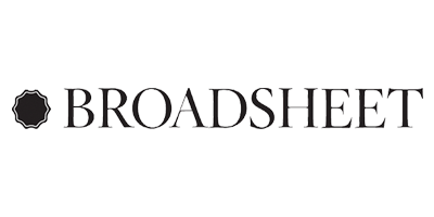the word broadsheet is written in black and white on a white background .