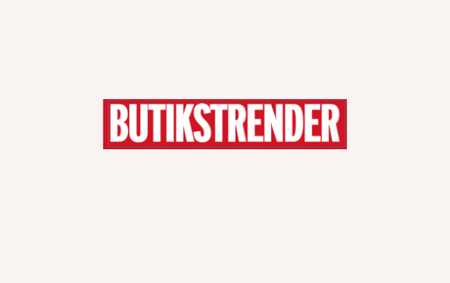 The word "BUTIKSTRENDER" in white, bold, capital letters within a red rectangular box, on a light background.