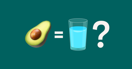 a half of an avocado next to a glass of water and a question mark