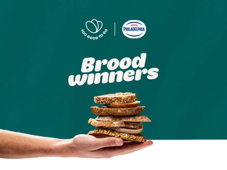 a hand holding a stack of bread with the words brood winners above it