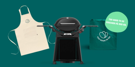 a bbq grill next to an apron that says too good to go