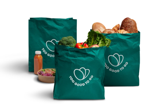 three green bags with food with Too Good To Go written on them
