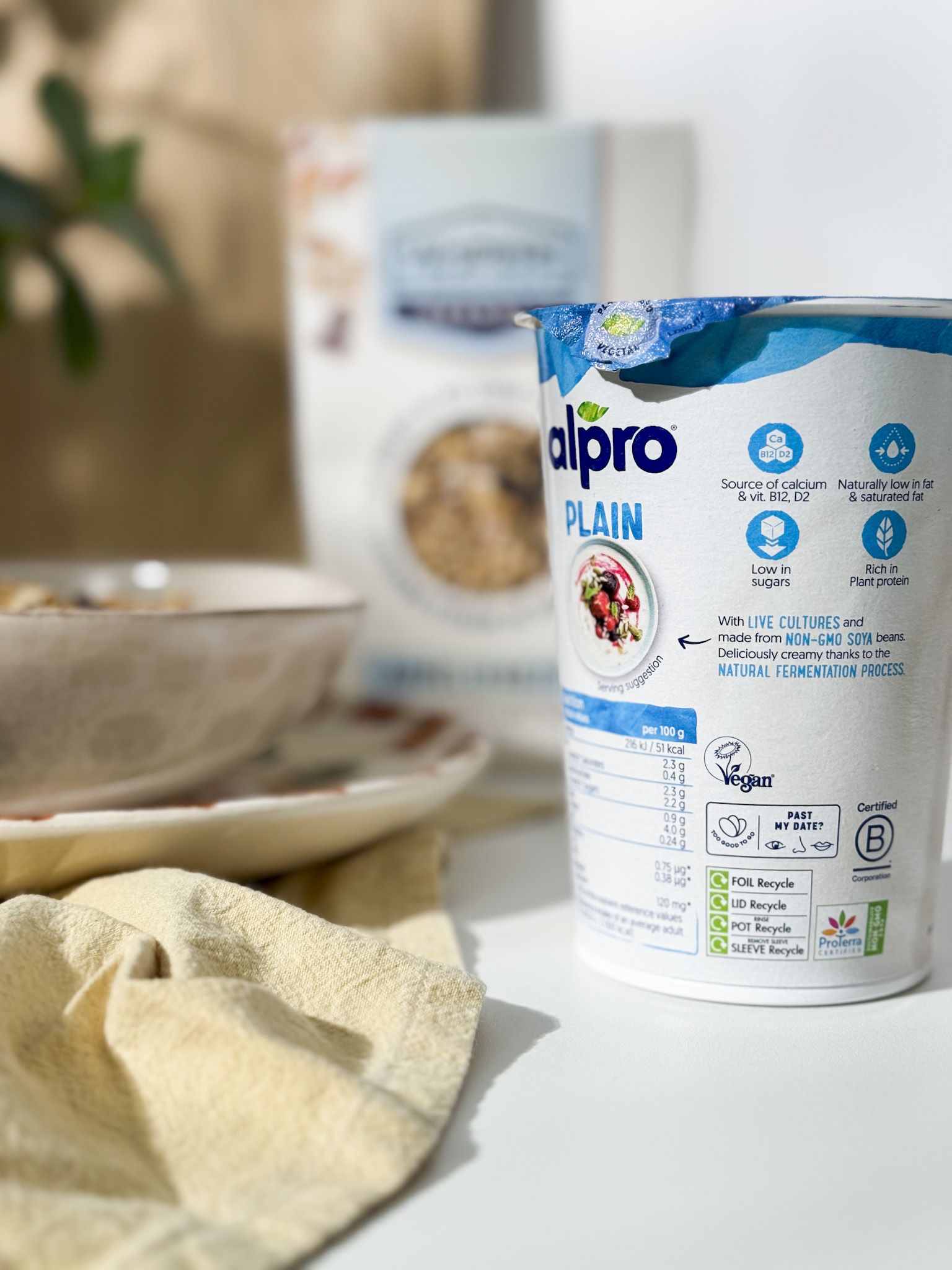 An Alpro yoghurt container 
