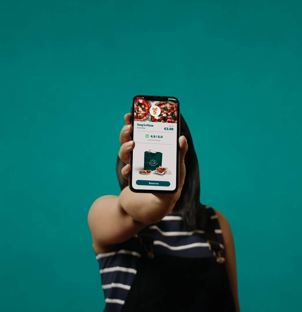 A user shows the interface of the too good to go app