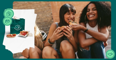 Smiling friends share pizza, with a Too Good To Go bag and food in an overlay.