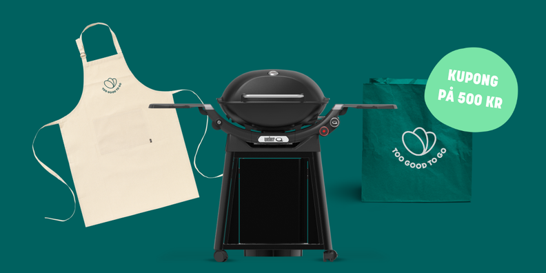 a weber grill sits next to an apron and a too good to go bag