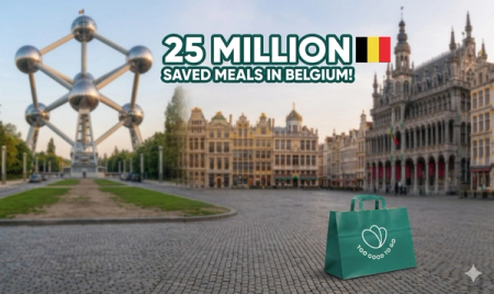 Green 'Too Good To Go' bag on a cobblestone square in Brussels, with the Atomium and historic buildings. Text reads '25 Million Saved Meals in Belgium!' alongside a Belgian flag.