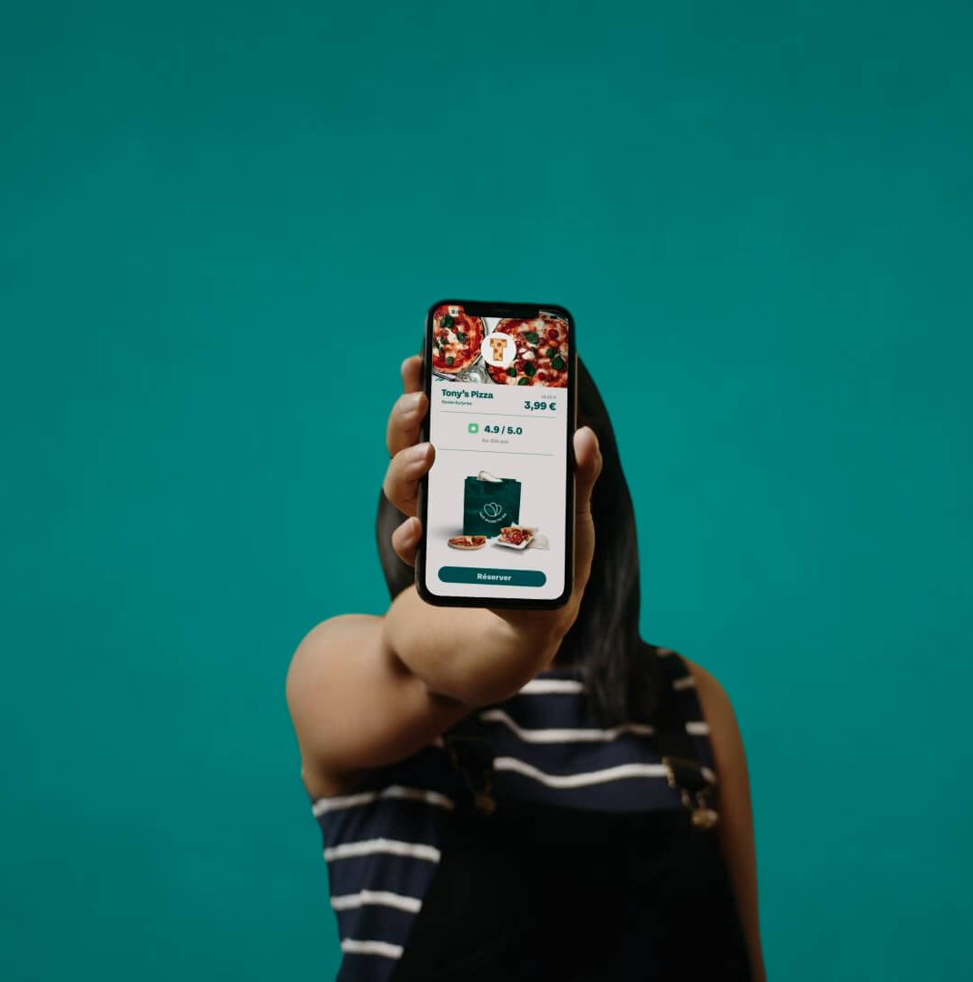 A user shows the app interface of too good to go