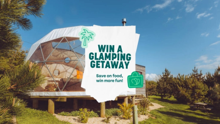 a sign that says win a glamping getaway