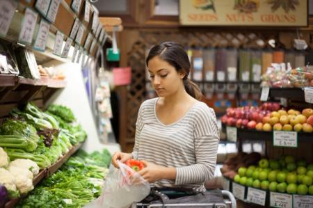 Shopper selecting fresh local produce