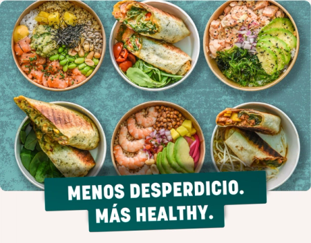 Six diverse healthy food bowls and wraps on a blue background. A green banner reads "MENOS DESPERDICIO. MÁS HEALTHY." (Less Waste. More Healthy.).