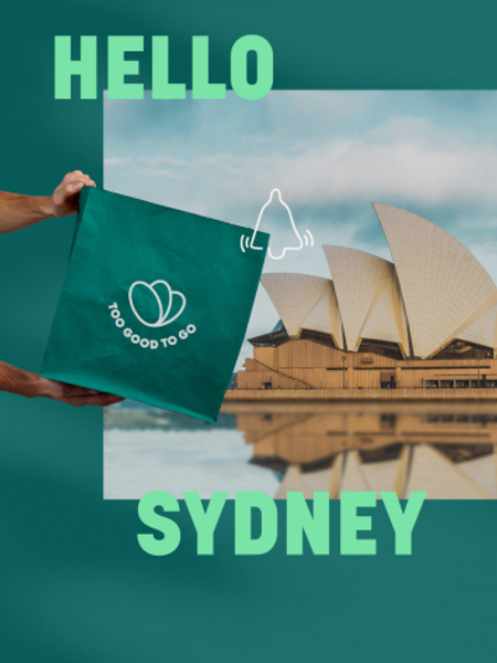 a person holding a bag that says hello sydney