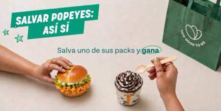 Two hands holding a Popeyes sandwich and a dessert cup with a spoon, next to a Too Good To Go bag. Text: "SALVAR POPEYES: ASÍ SÍ. Salva uno de sus packs y gana."