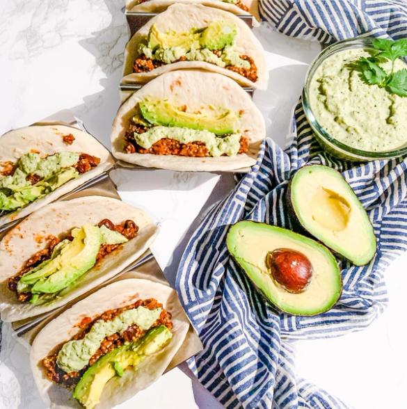 Tacos, avocado and guacamole nicely presented on a counter