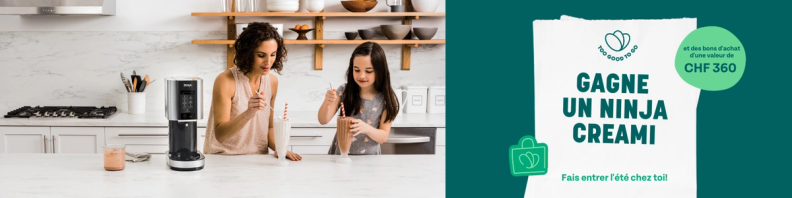 a woman and child in a kitchen with a sign that says gagne un ninja creami