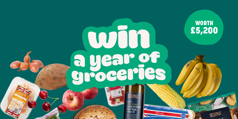 a green sign that says win a year of groceries